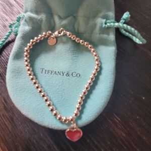 Tiffany & Co. Silver Bracelet with Red Heart Charm